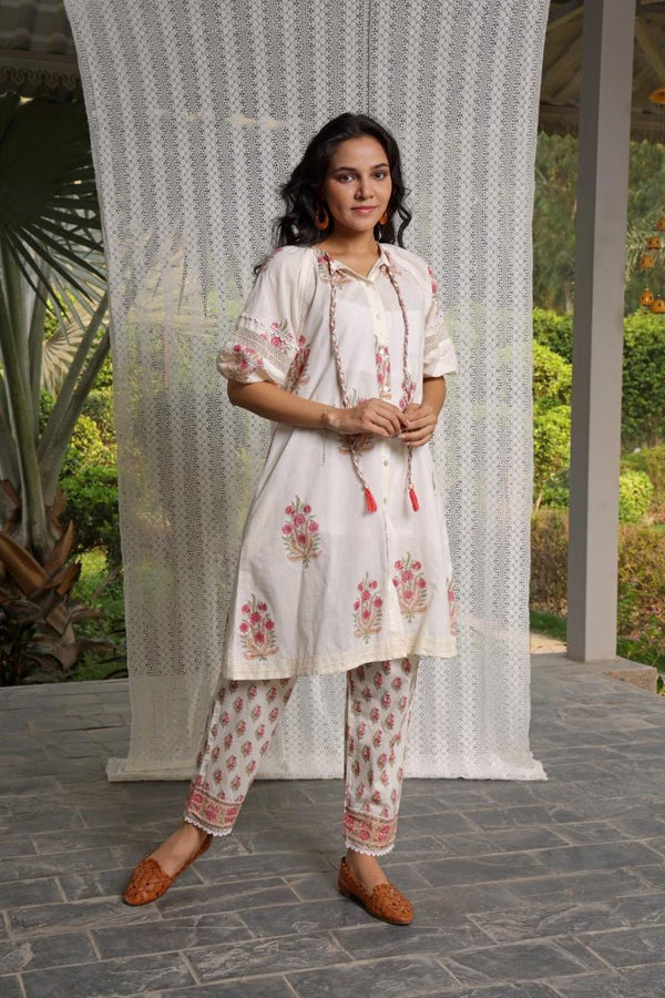 White and pink hand block printed tunic kurta teamed with narrow pants