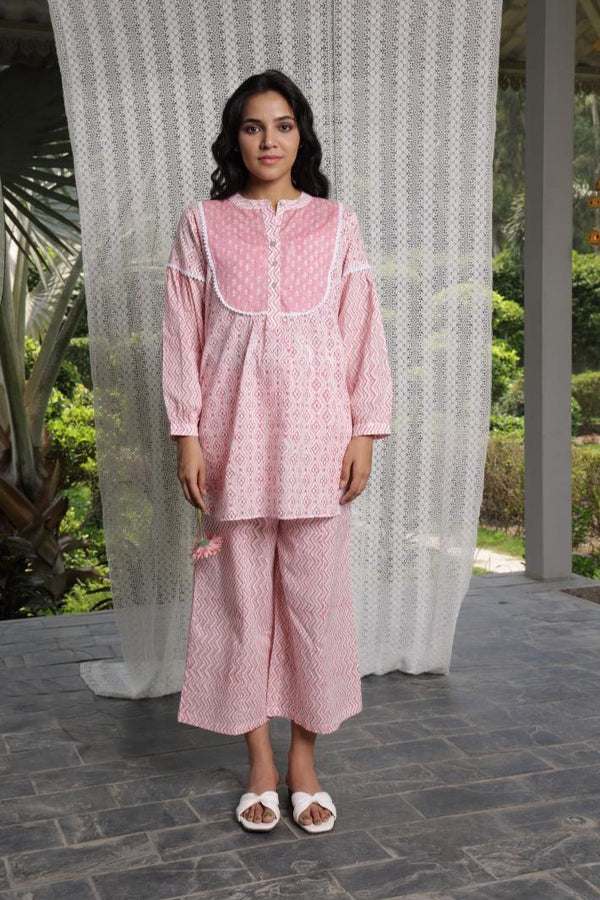 White and pink hand block printed tunic teamed with crop pants